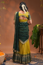 Lime yellow plain half saree with matching blouse and contrast zari border and dhavani