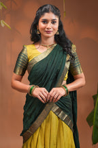 Lime yellow plain half saree with matching blouse and contrast zari border and dhavani