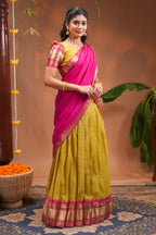 Mustard plain half saree with matching blouse and contrast zari border and dhavani