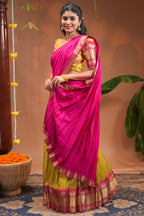Mustard plain half saree with matching blouse and contrast zari border and dhavani