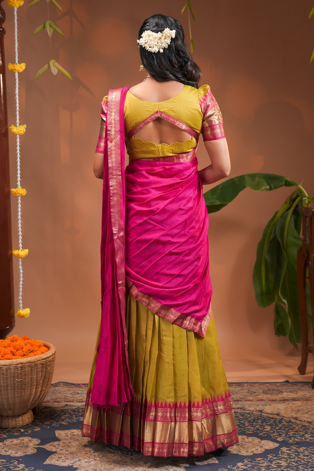 Mustard plain half saree with matching blouse and contrast zari border and dhavani