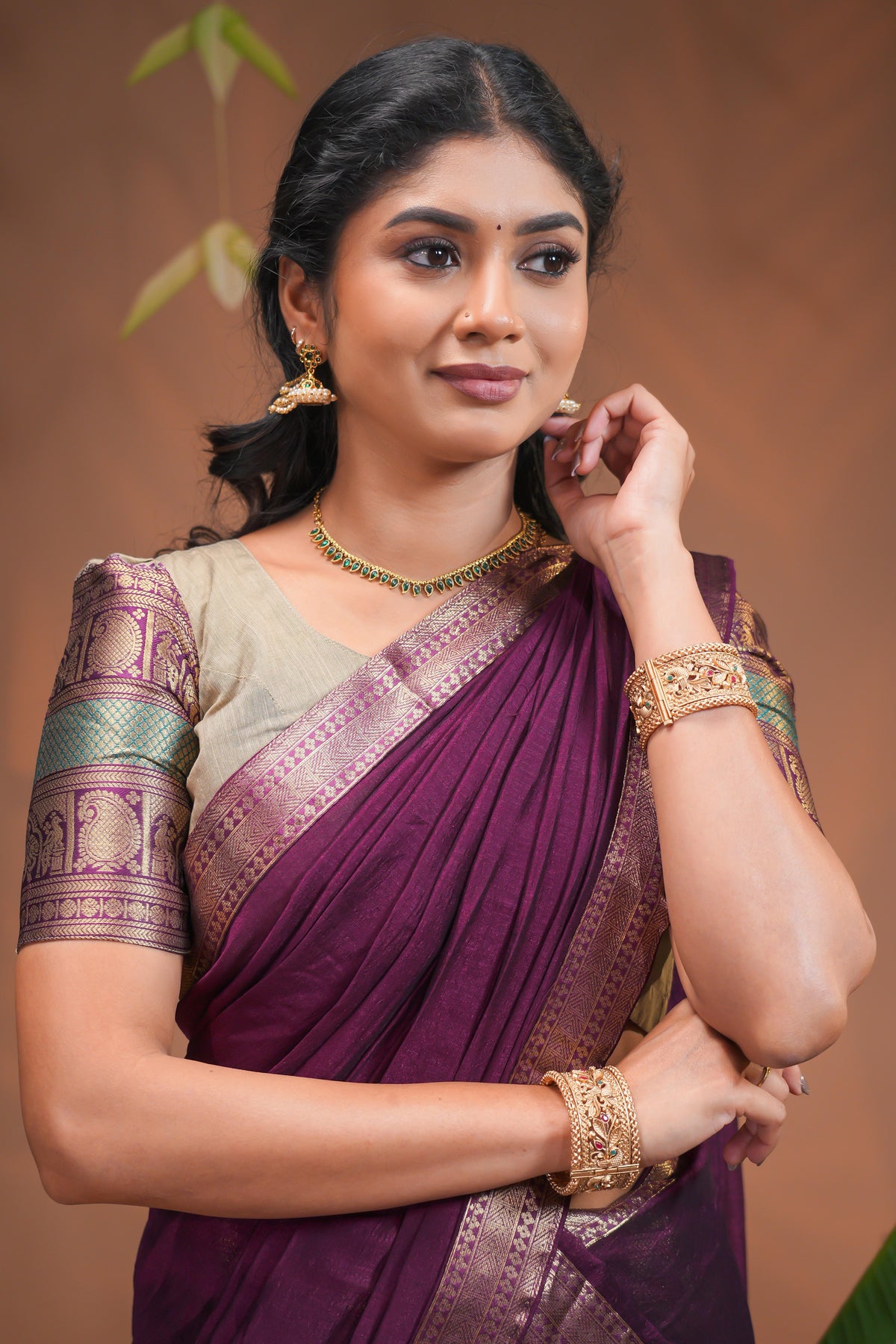 Beige plain half saree with matching blouse and contrast zari border and dhavani
