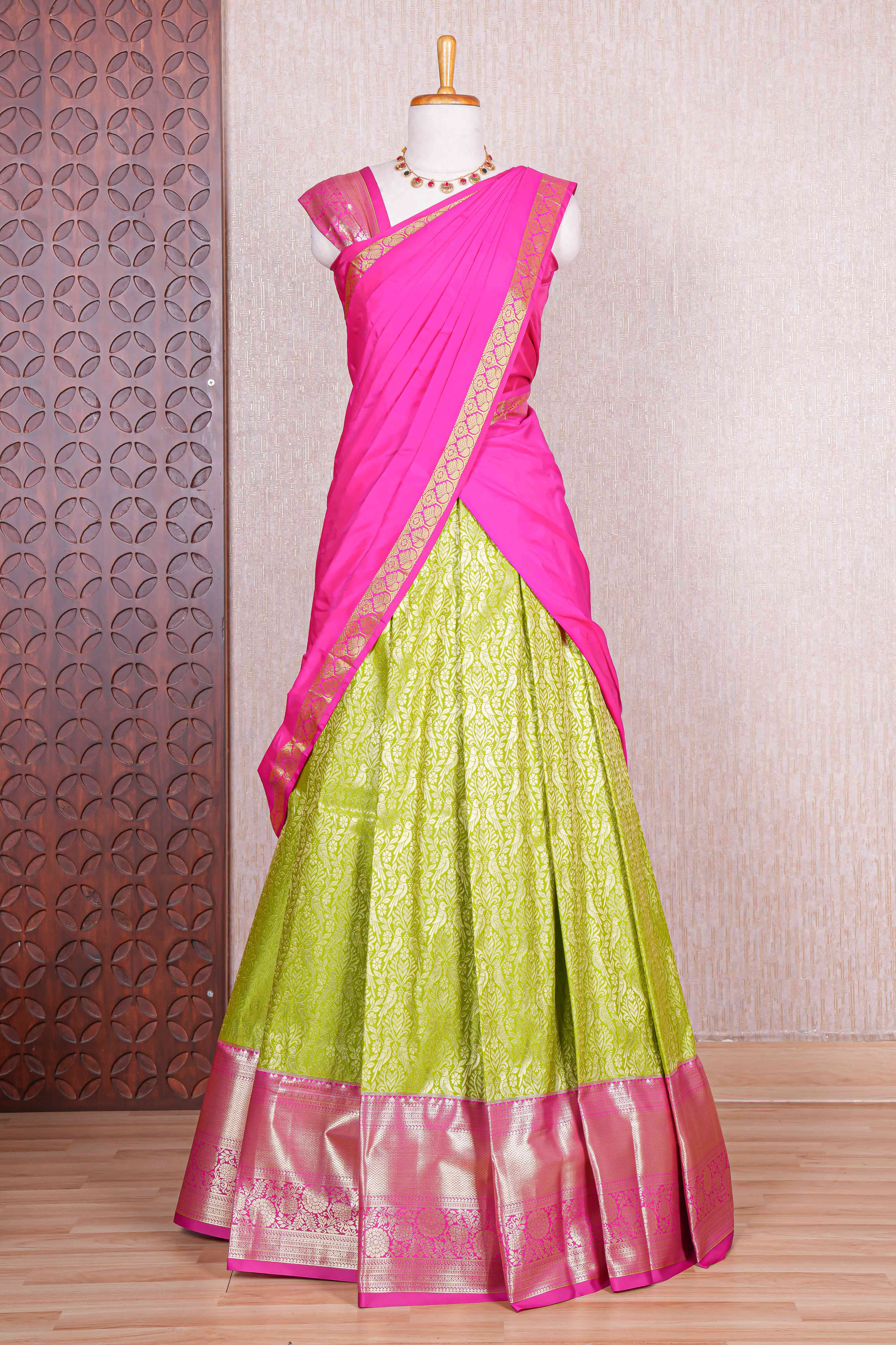 Green jacquard birds and floral zari design half saree with contrast zari border and dhavani