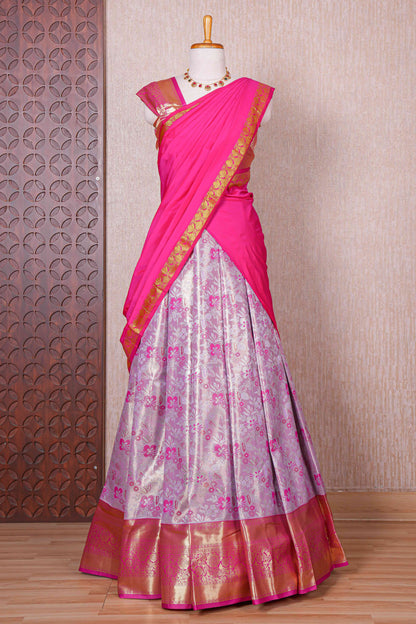 Pastel lavender jacquard floral zari design half saree with contrast zari border and dhavani