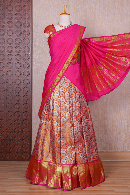 Orange jacquard floral zari design half saree with contrast zari border and dhavani