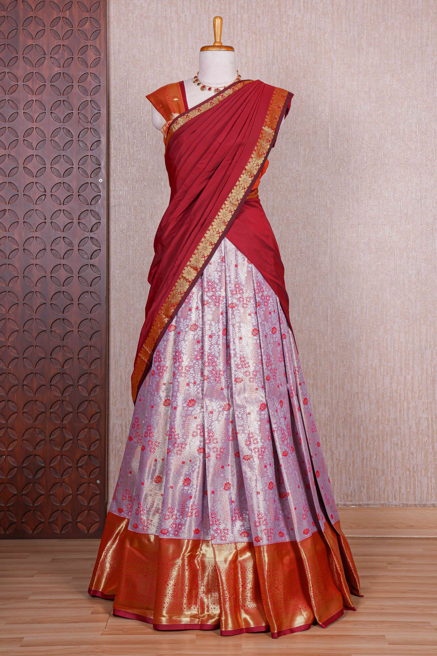 Pastel lavender jacquard floral zari design half saree with contrast zari border and dhavani