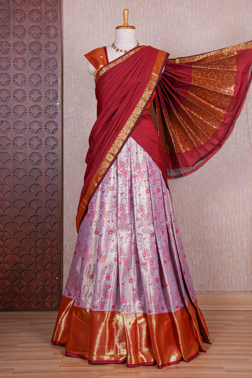 Pastel lavender jacquard floral zari design half saree with contrast zari border and dhavani