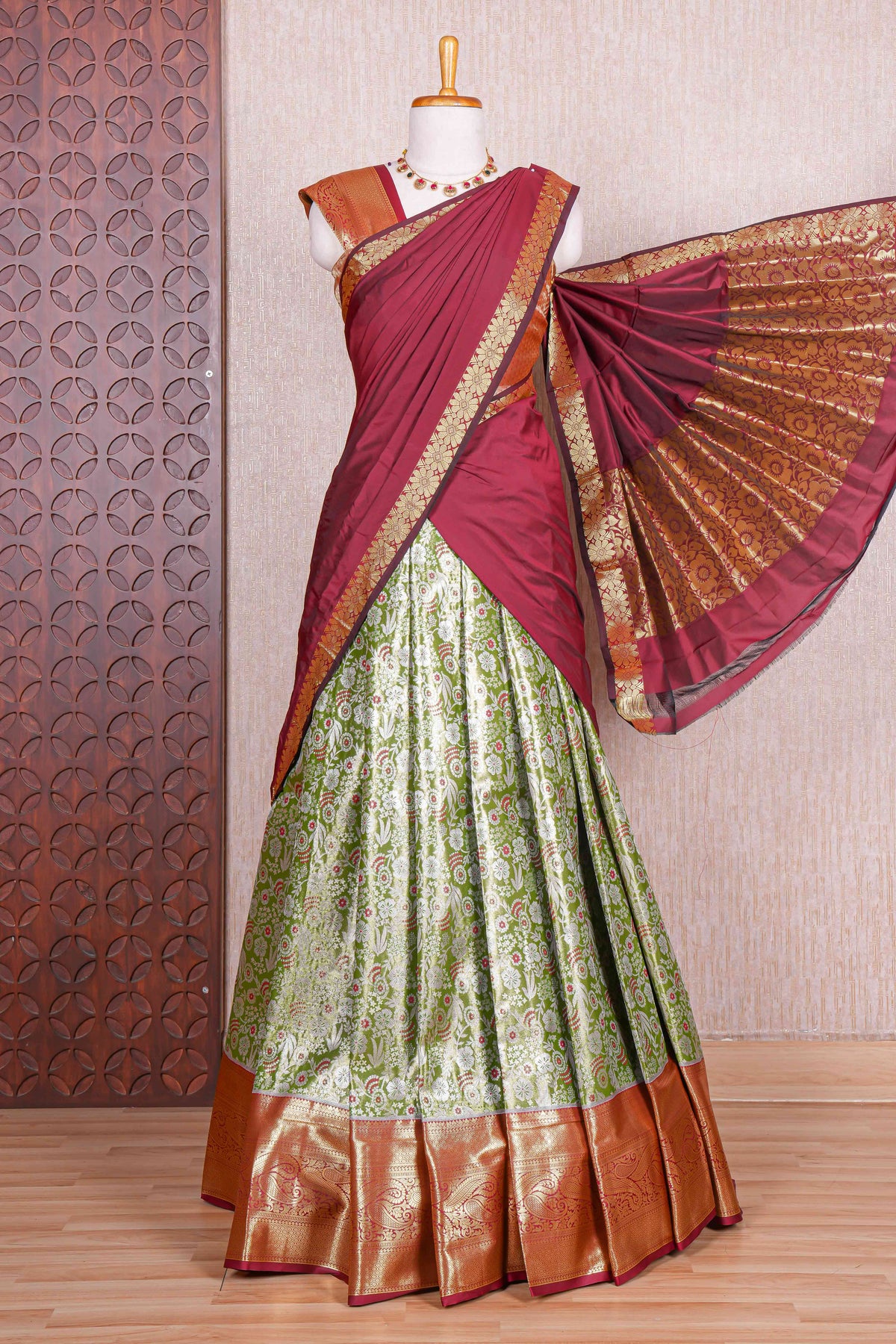 Forest green jacquard floral zari design half saree with contrast zari border and dhavani