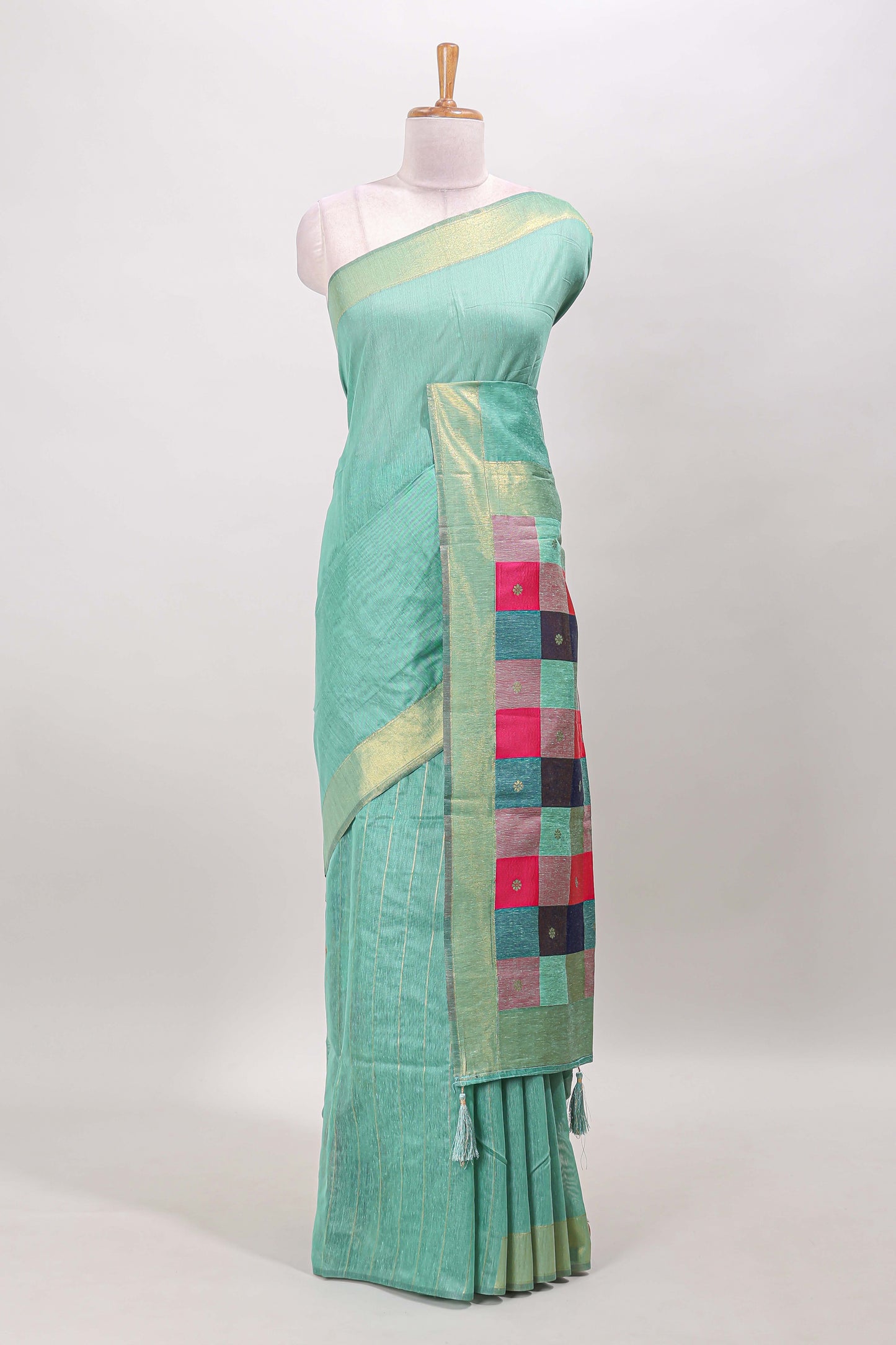 Turquoise green striped linen cotton saree with self zari border contrast checked pallu