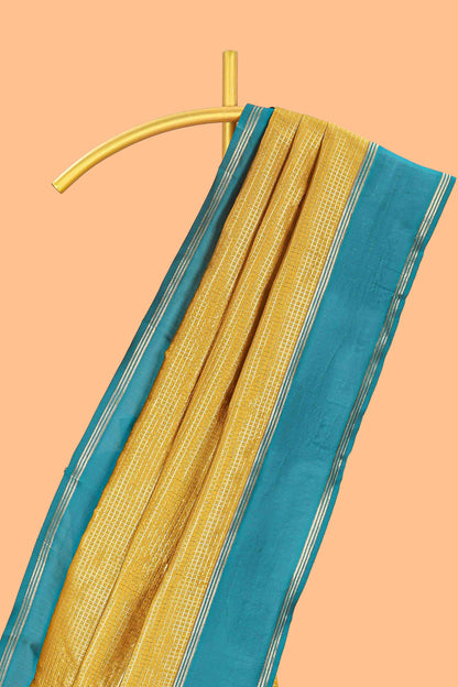 Golden yellow zari checked art litchi silk saree with contrast border and zari butta blouse