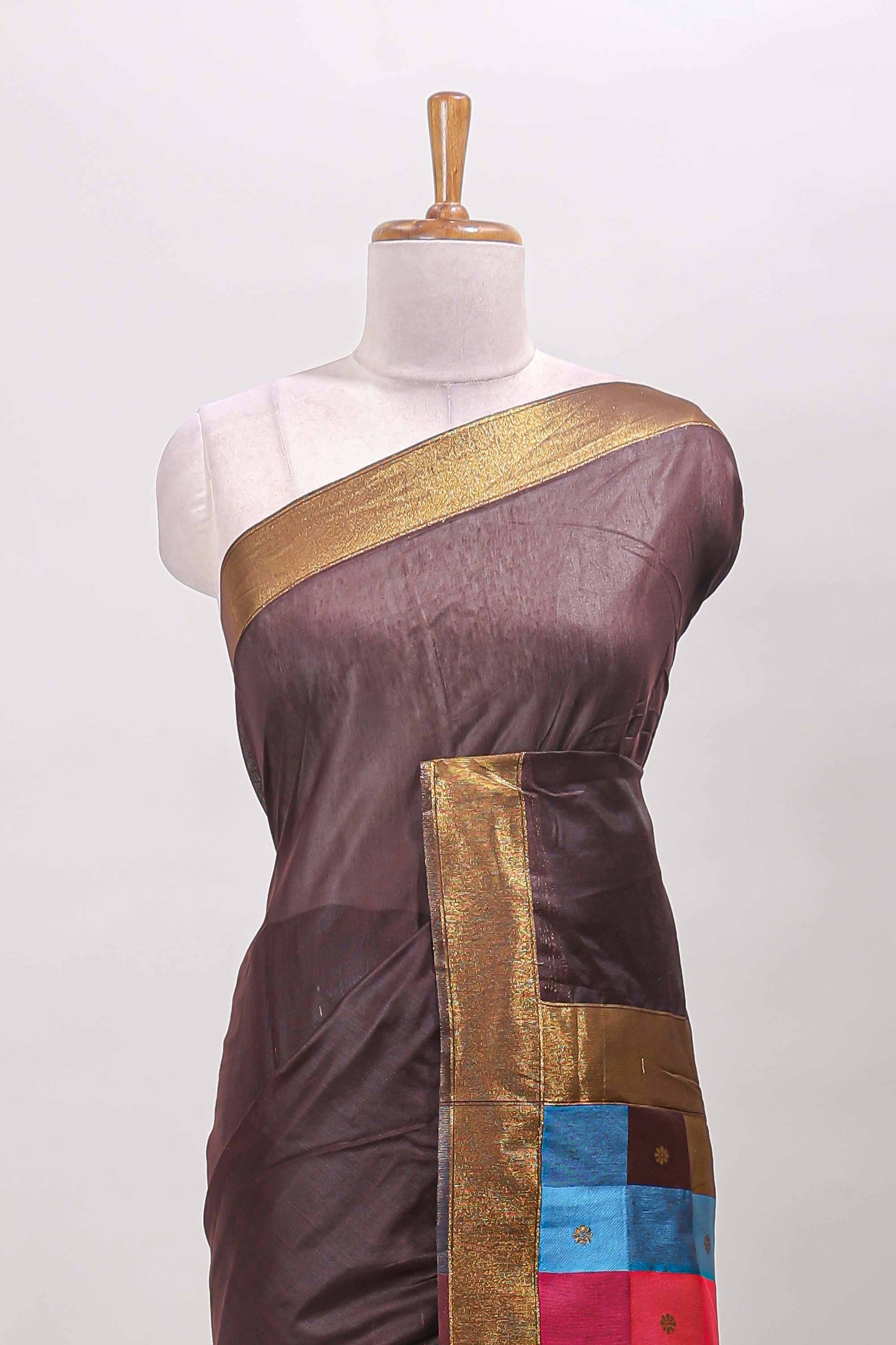 Chocolate brown striped linen cotton saree with self zari border contrast checked pallu