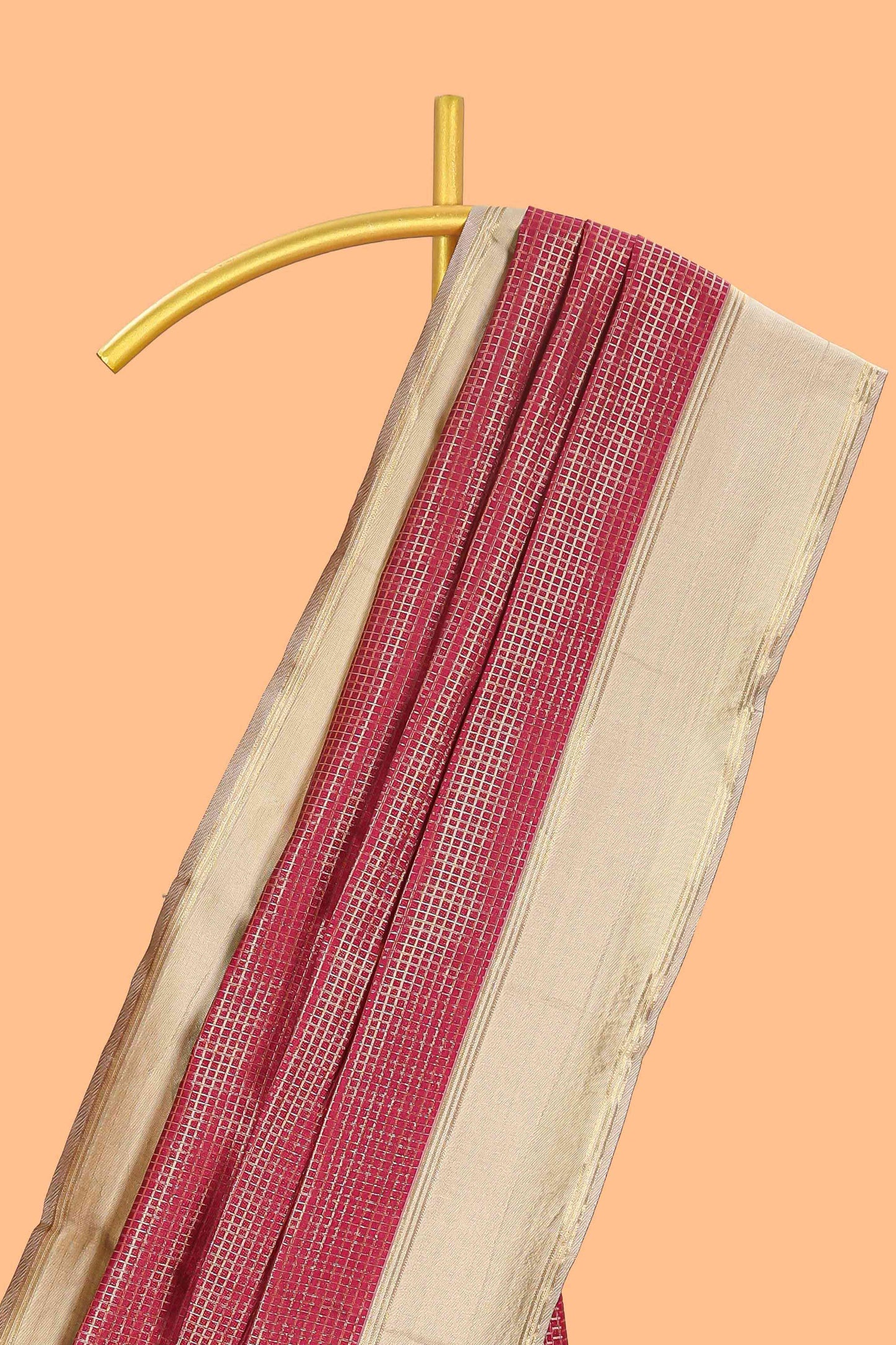 Maroon zari checked art litchi silk saree with contrast border and zari butta blouse