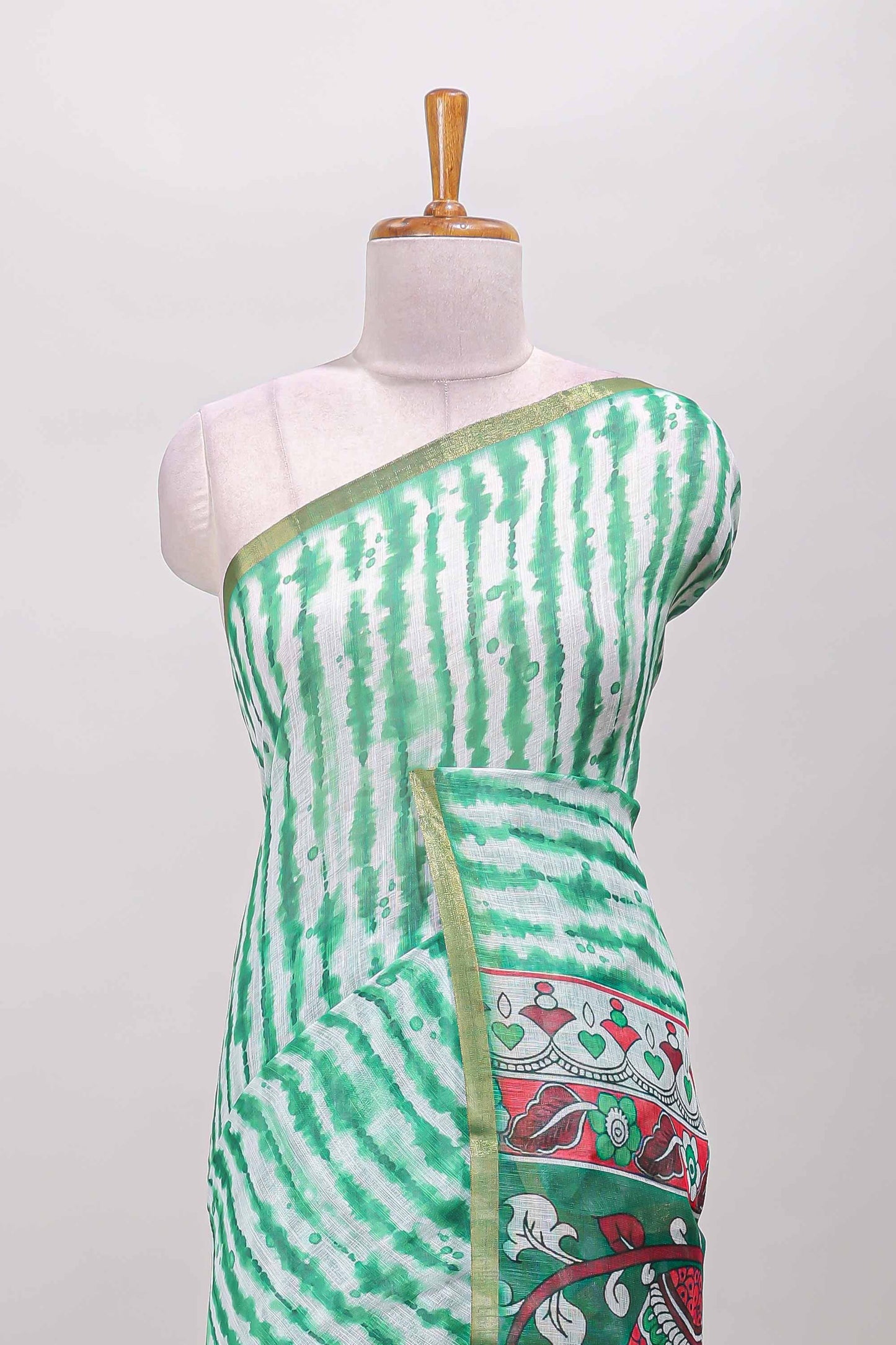 Green striped shibori print linen cotton saree with self zari border and printed pallu