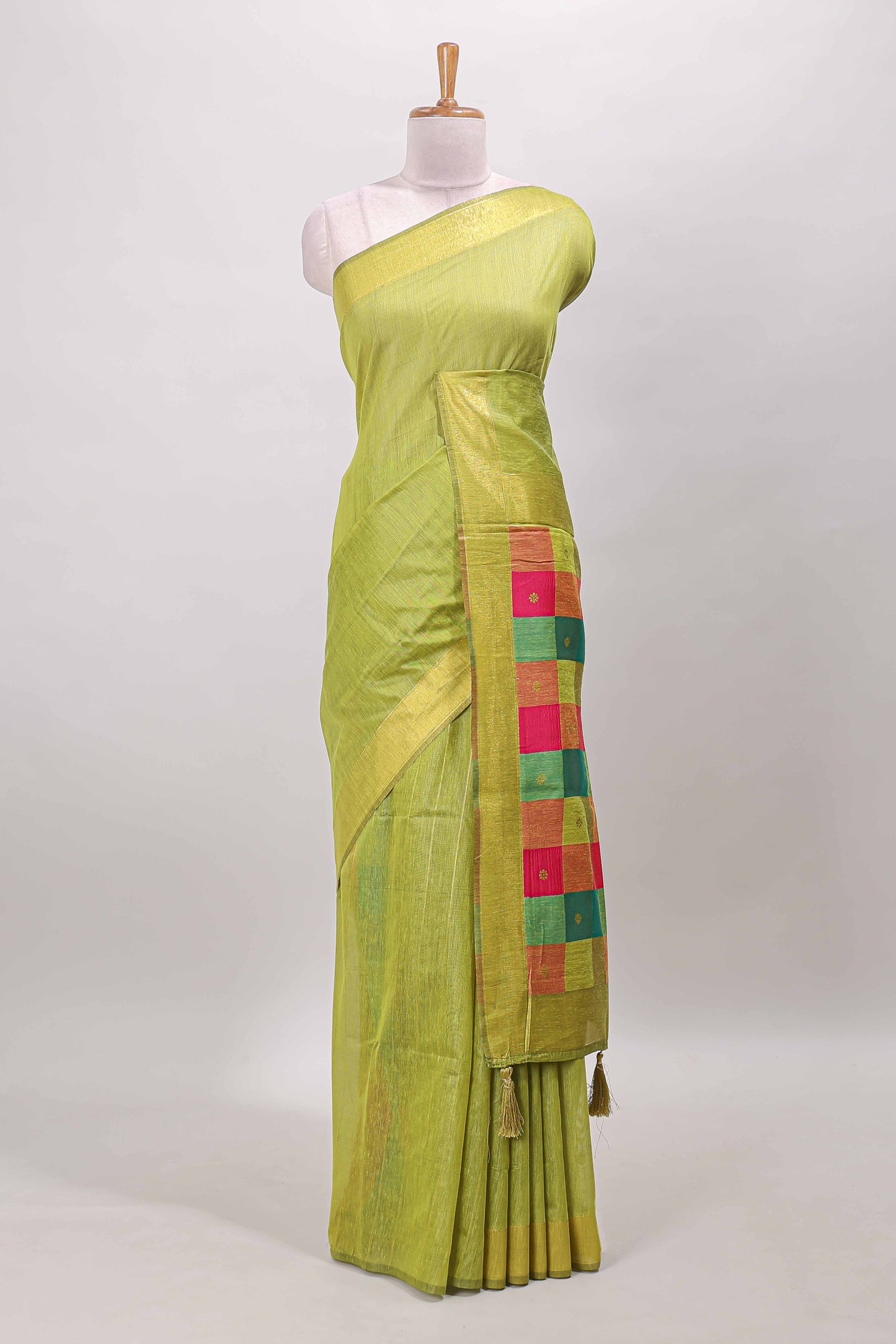 Green striped linen cotton saree with self zari border contrast checked pallu