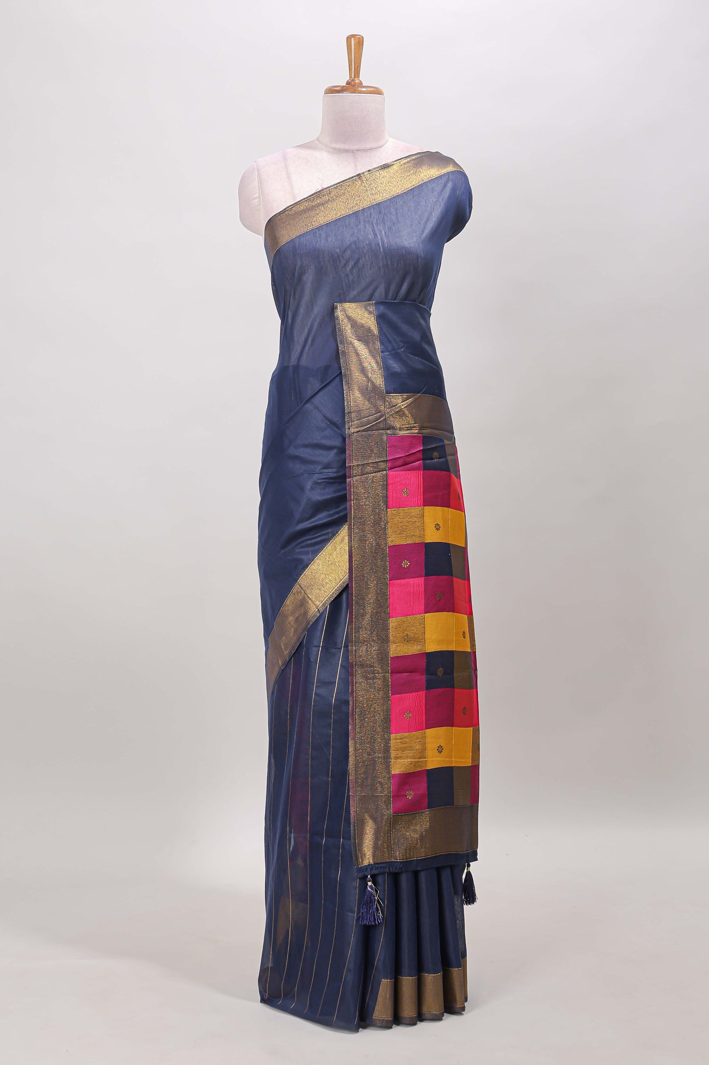 Blue striped linen cotton saree with self zari border contrast checked pallu