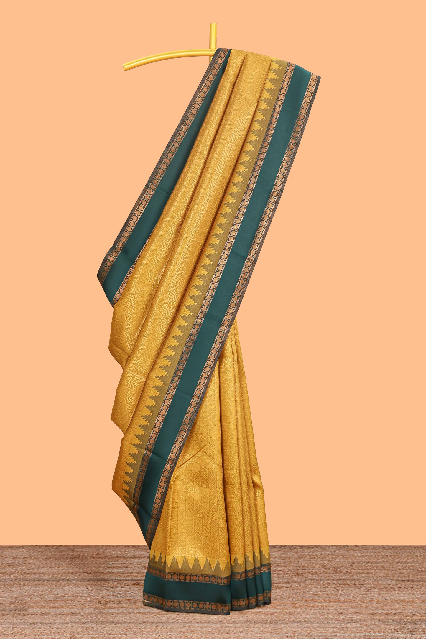 Mustard checked geometric design litchi silk saree with contrast ikkat style bentex zari border and blouse
