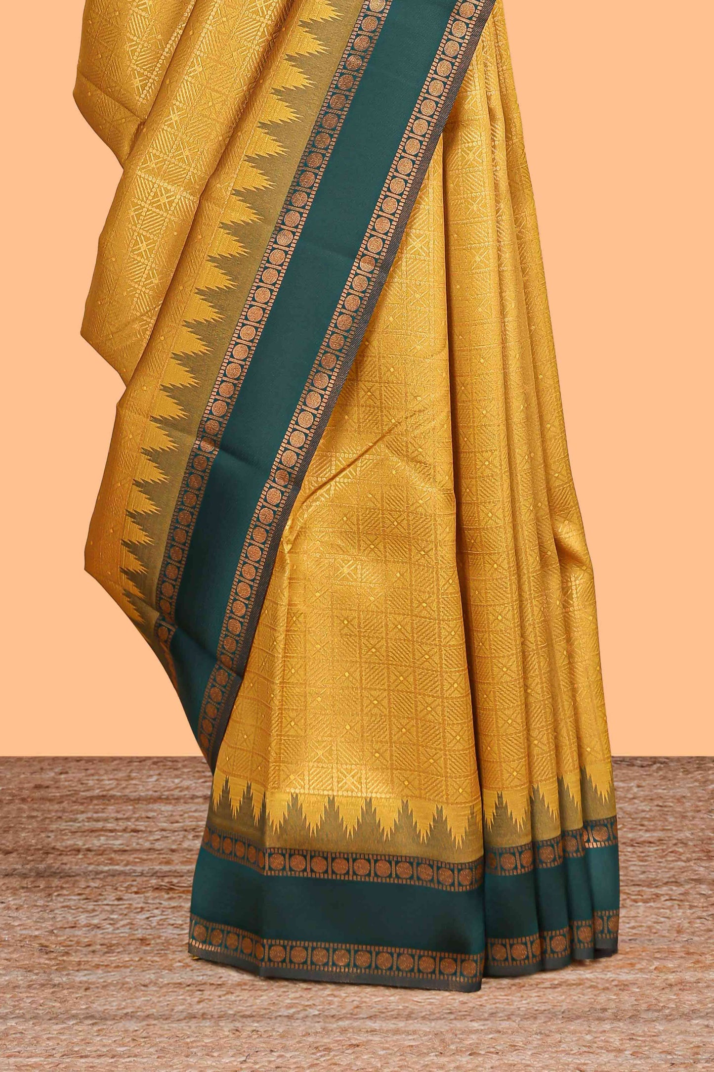 Mustard checked geometric design litchi silk saree with contrast ikkat style bentex zari border and blouse