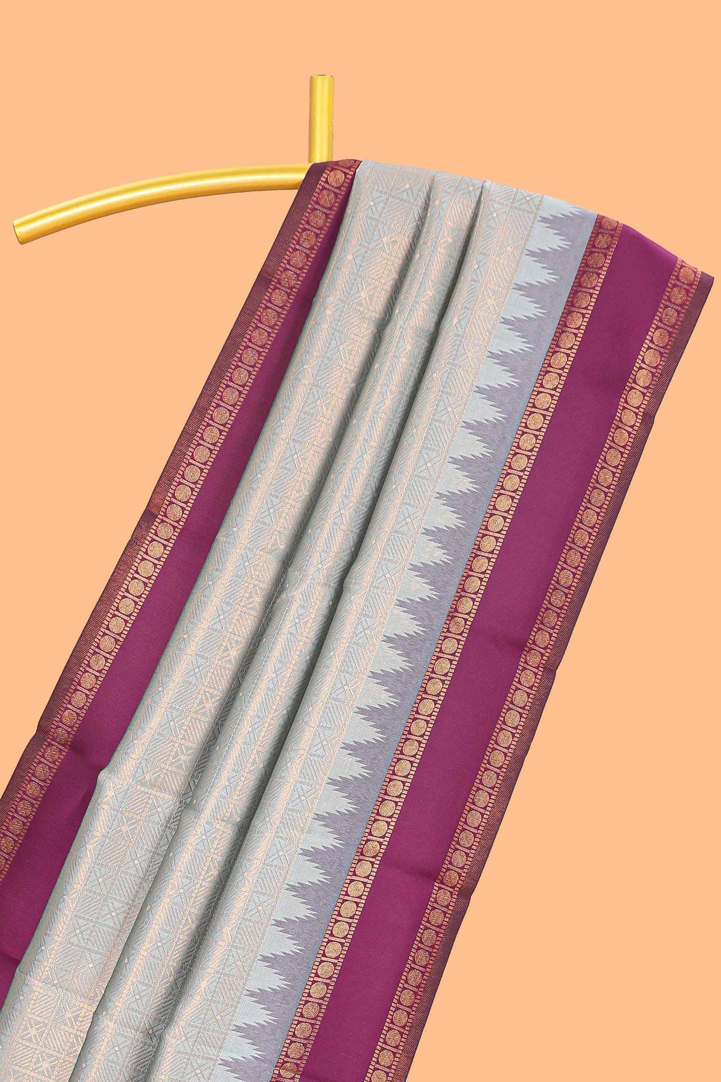 Turquoise green checked geometric design litchi silk saree with contrast ikkat style bentex zari border and blouse