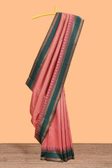 Pink checked geometric design litchi silk saree with contrast ikkat style bentex zari border and blouse