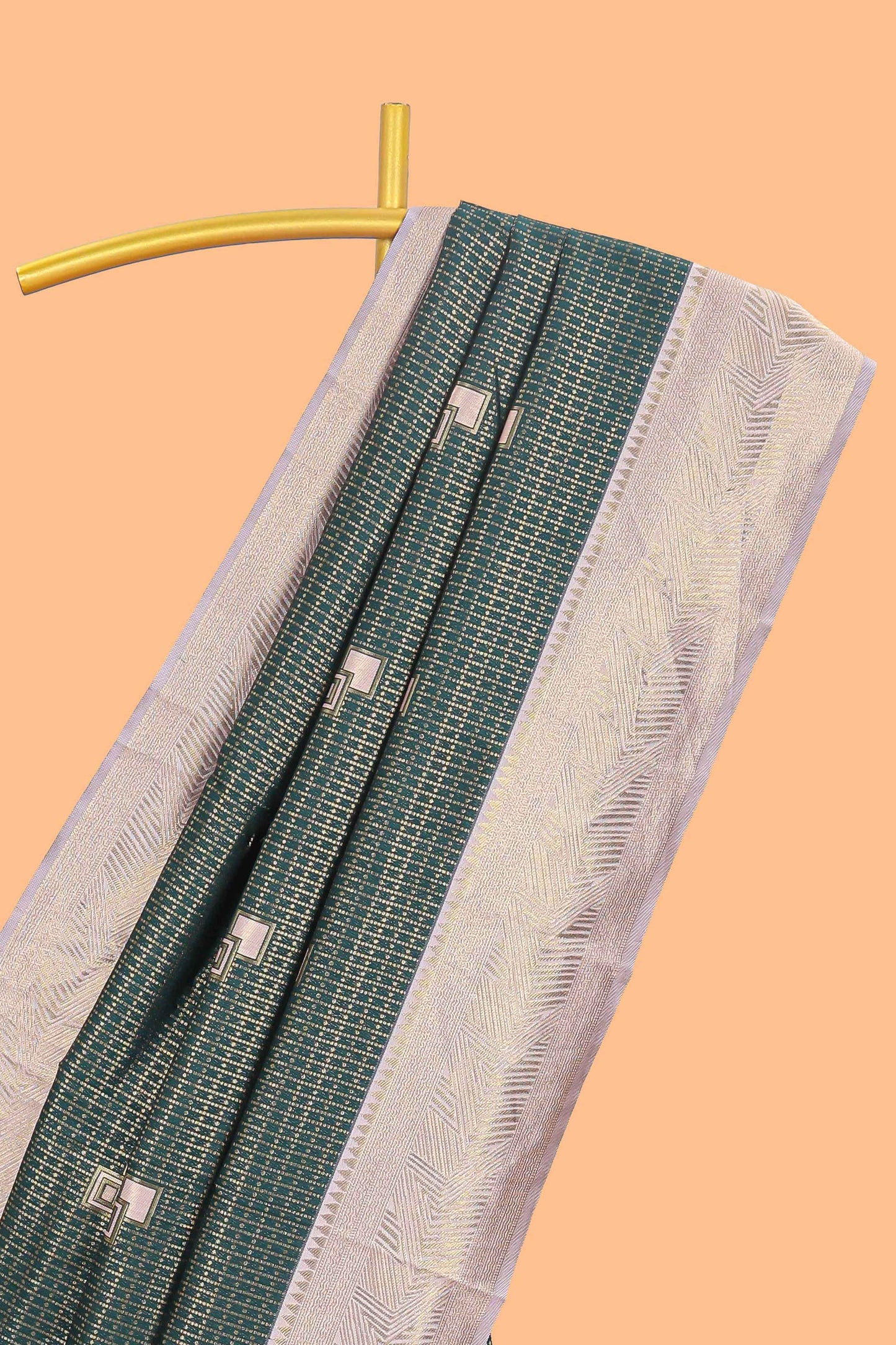 Green checked geometric design litchi silk saree with contrast zari border and blouse