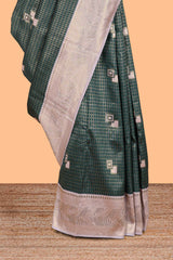 Green checked geometric design litchi silk saree with contrast zari border and blouse