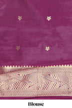 Pale pink checked geometric design litchi silk saree with contrast zari border and blouse