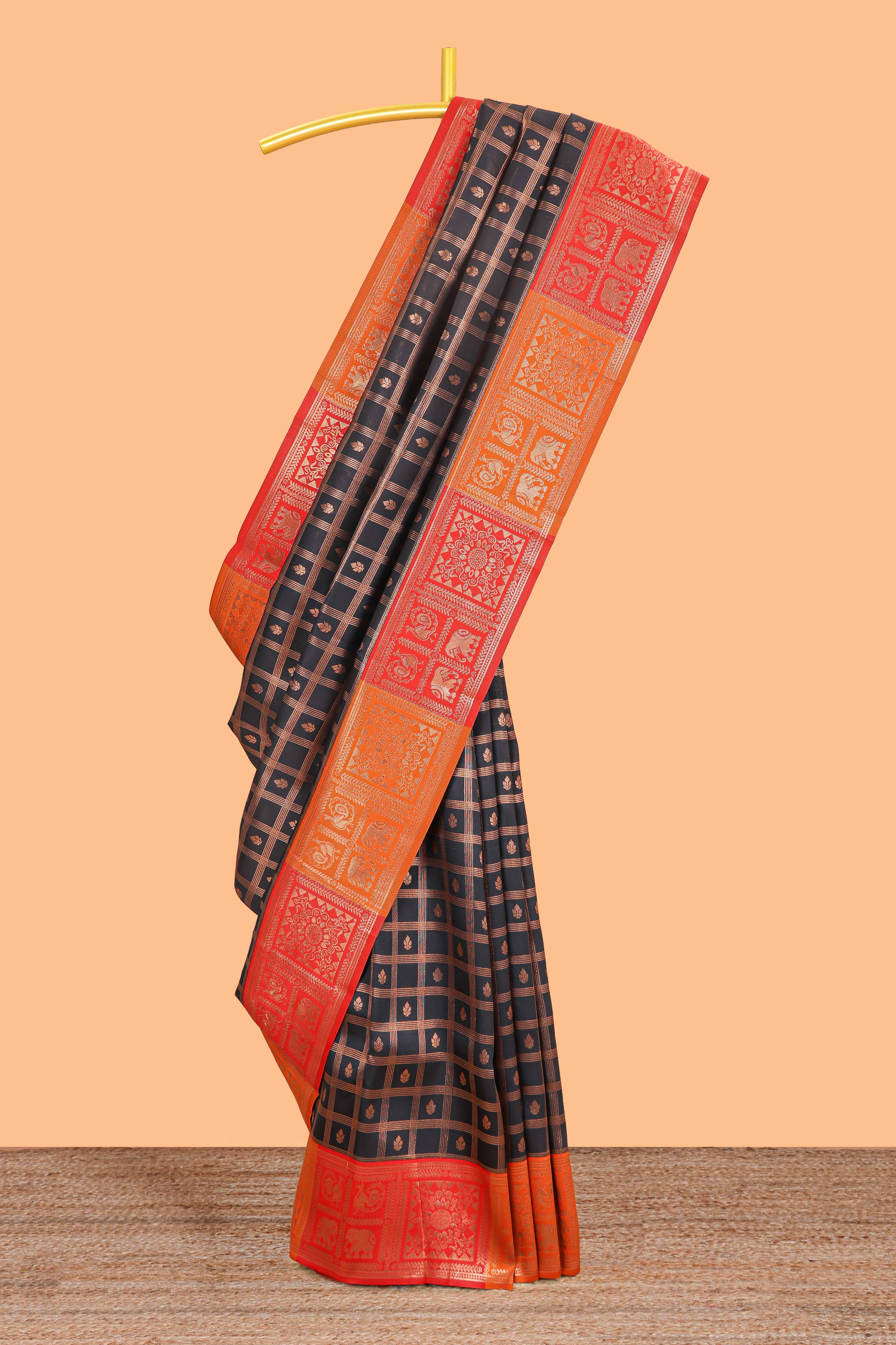 Black checked floral motifs litchi silk saree with contrast zari border and zari butta blouse