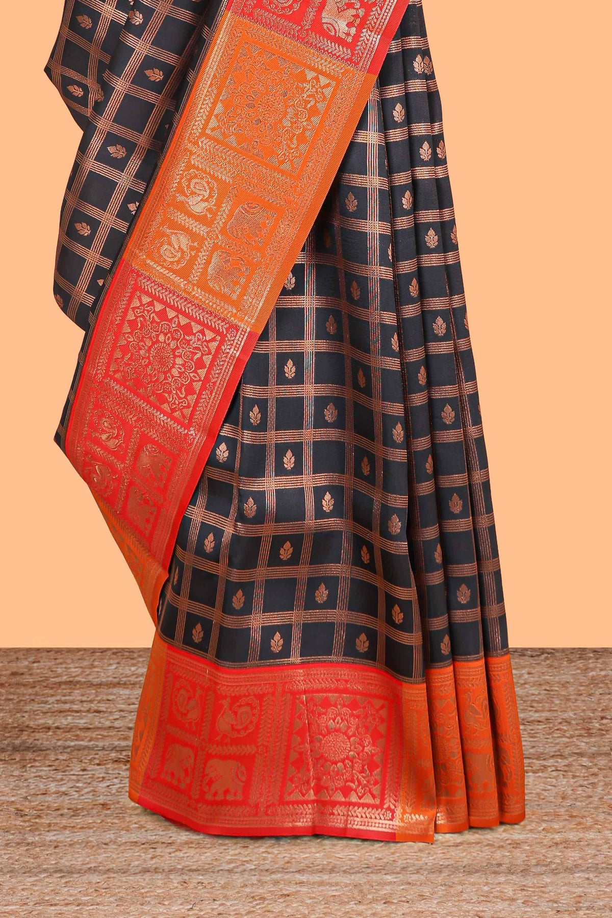 Black checked floral motifs litchi silk saree with contrast zari border and zari butta blouse