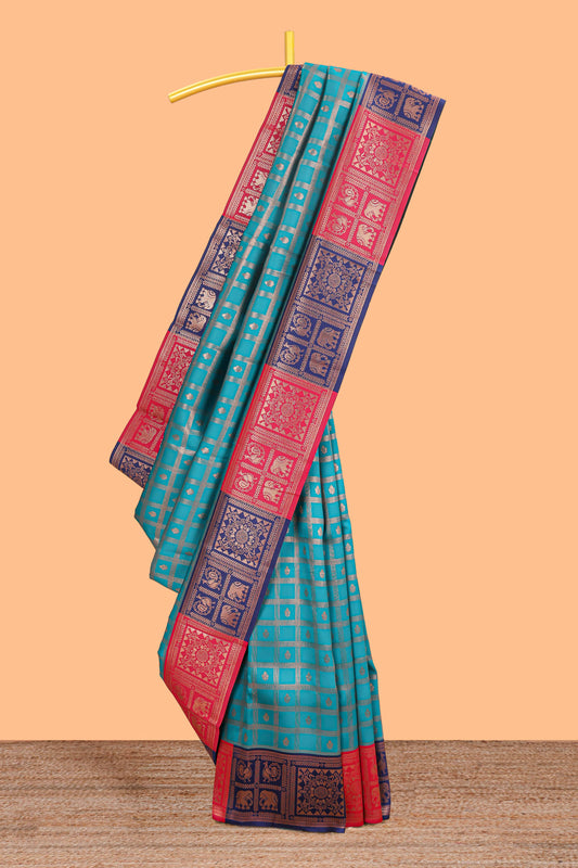 Turquiose green checked floral motifs litchi silk saree with contrast zari border and zari butta blouse
