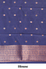 Turquiose green checked floral motifs litchi silk saree with contrast zari border and zari butta blouse