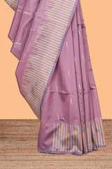 Sunset purple geometric style motifs litchi silk saree with contrast striped border and blouse