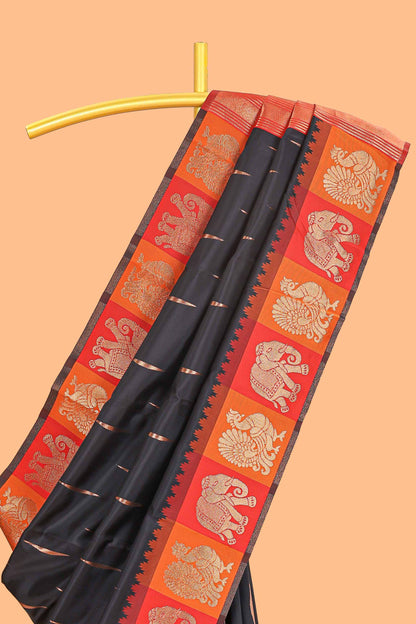 Black litchi silk saree with contrast elephant & peacock zari border and blouse