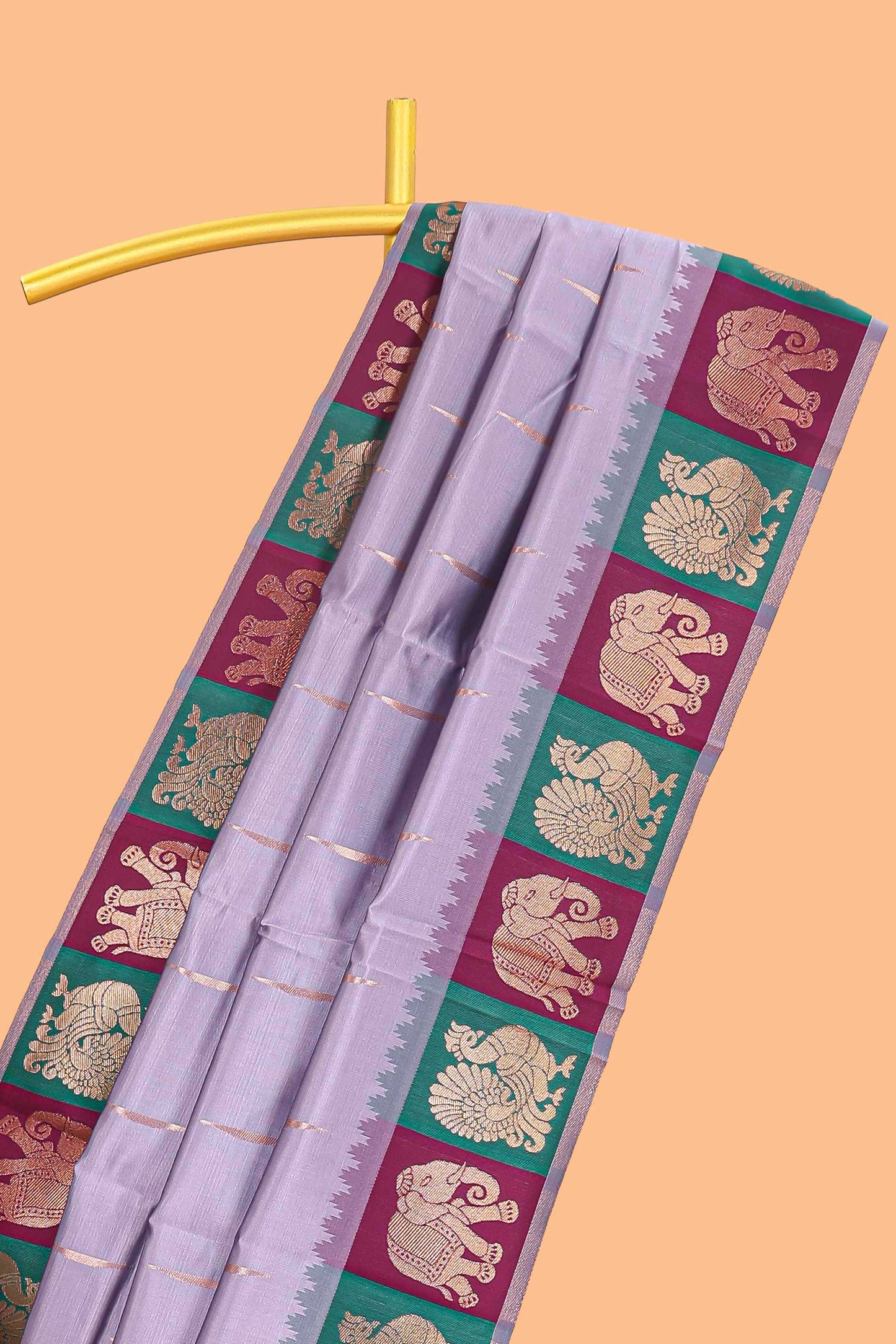 Lavender litchi silk saree with contrast elephant & peacock zari border and blouse