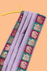 Lavender litchi silk saree with contrast elephant & peacock zari border and blouse