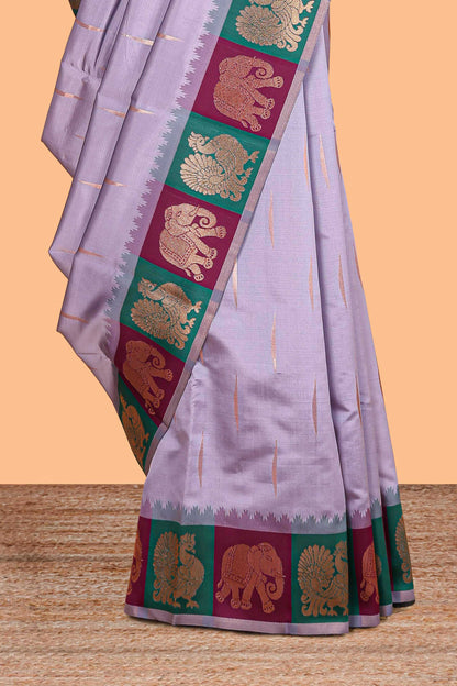 Lavender litchi silk saree with contrast elephant & peacock zari border and blouse