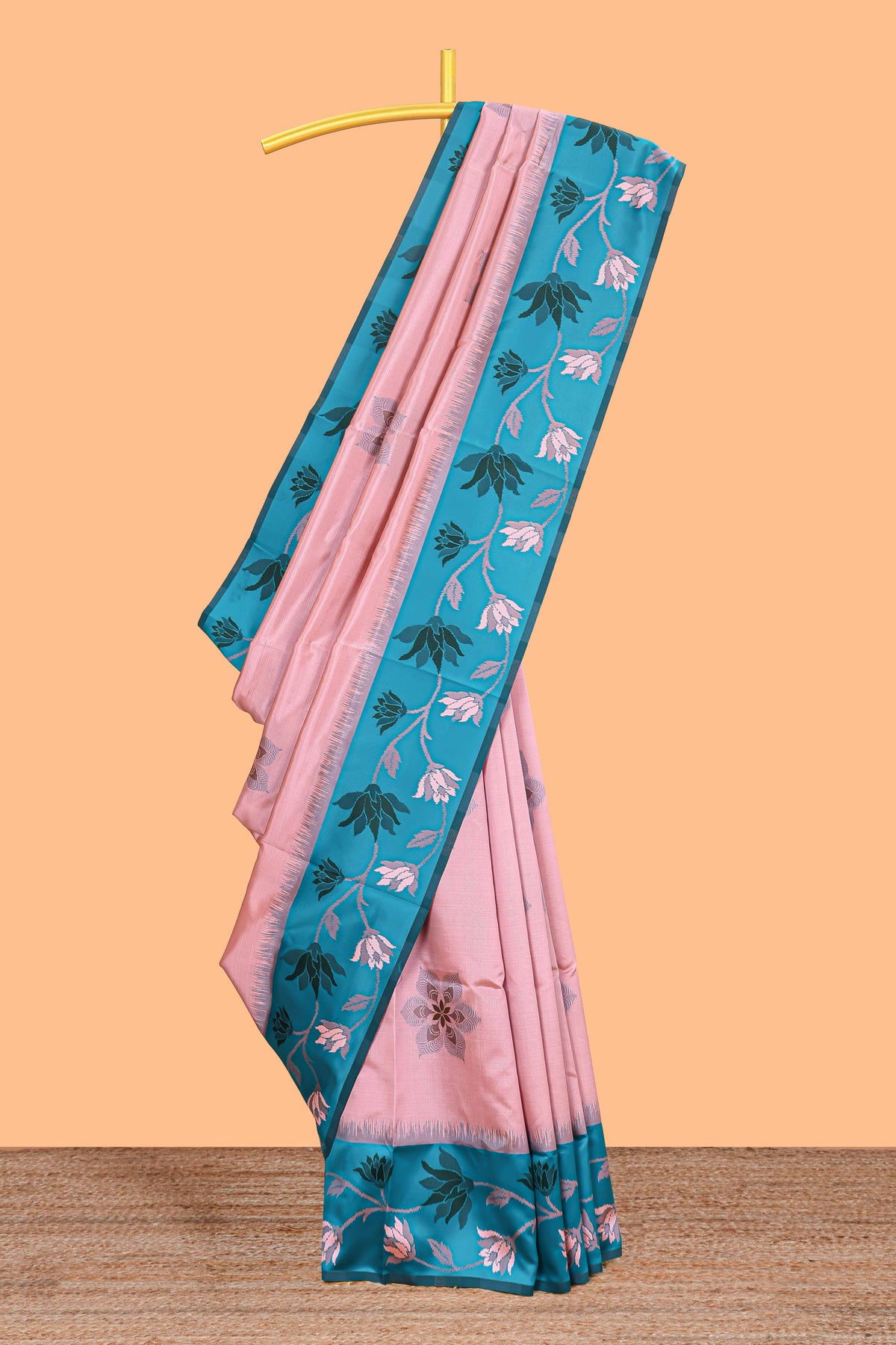 Baby pink floral motifs litchi silk saree with contrast floral vine border and blouse