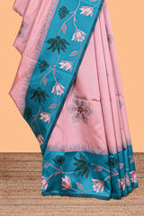 Baby pink floral motifs litchi silk saree with contrast floral vine border and blouse