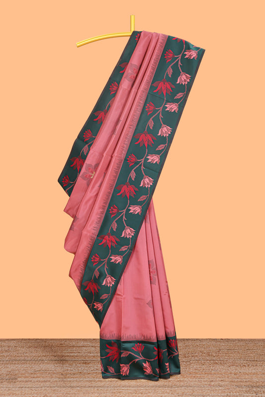 Pink floral motifs litchi silk saree with contrast floral vine border and blouse