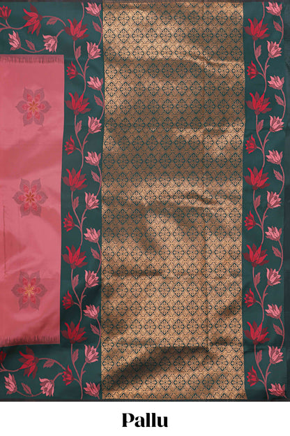 Pink floral motifs litchi silk saree with contrast floral vine border and blouse