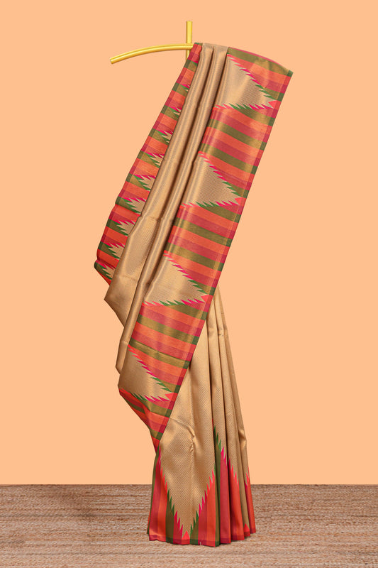 Golden plain litchi silk saree with contrast multi color ikkat style border and blouse