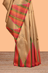Golden plain litchi silk saree with contrast multi color ikkat style border and blouse