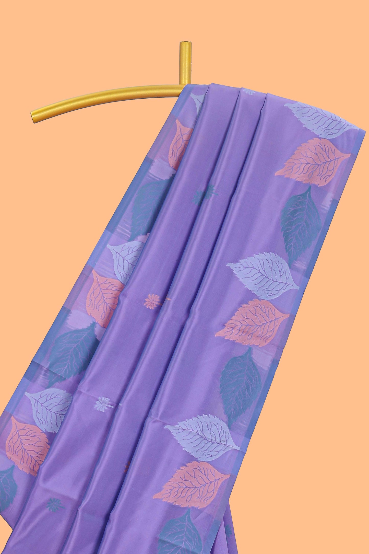 Borderless lavender floral motifs litchi silk saree with multi color bottom leaf designs and contrast blouse