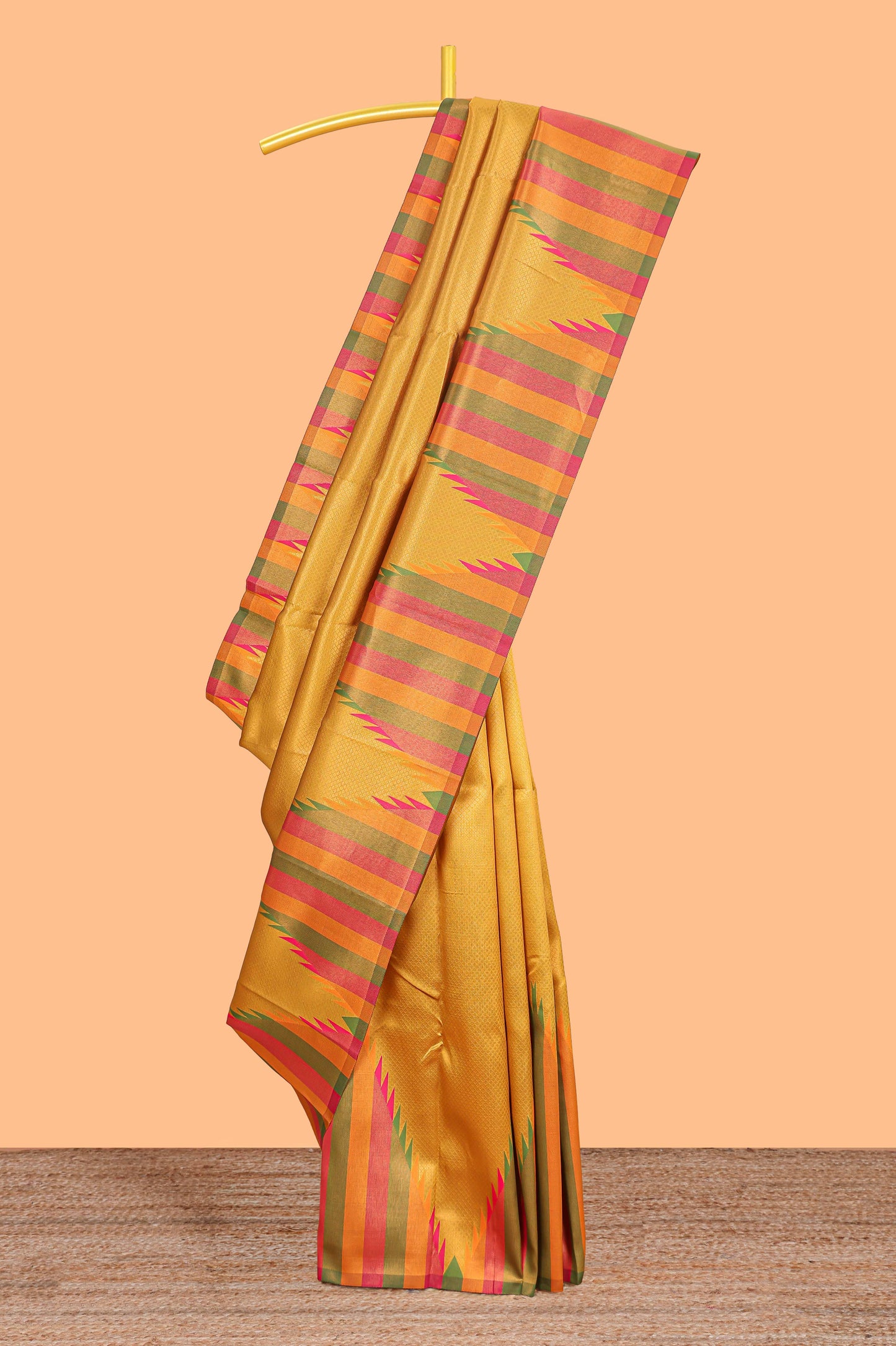 Mustard plain litchi silk saree with contrast multi color ikkat style border and blouse