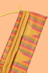 Mustard plain litchi silk saree with contrast multi color ikkat style border and blouse