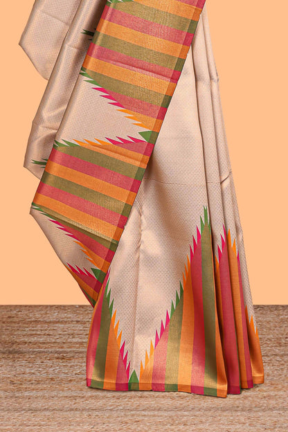Beige plain litchi silk saree with contrast multi color ikkat style border and blouse