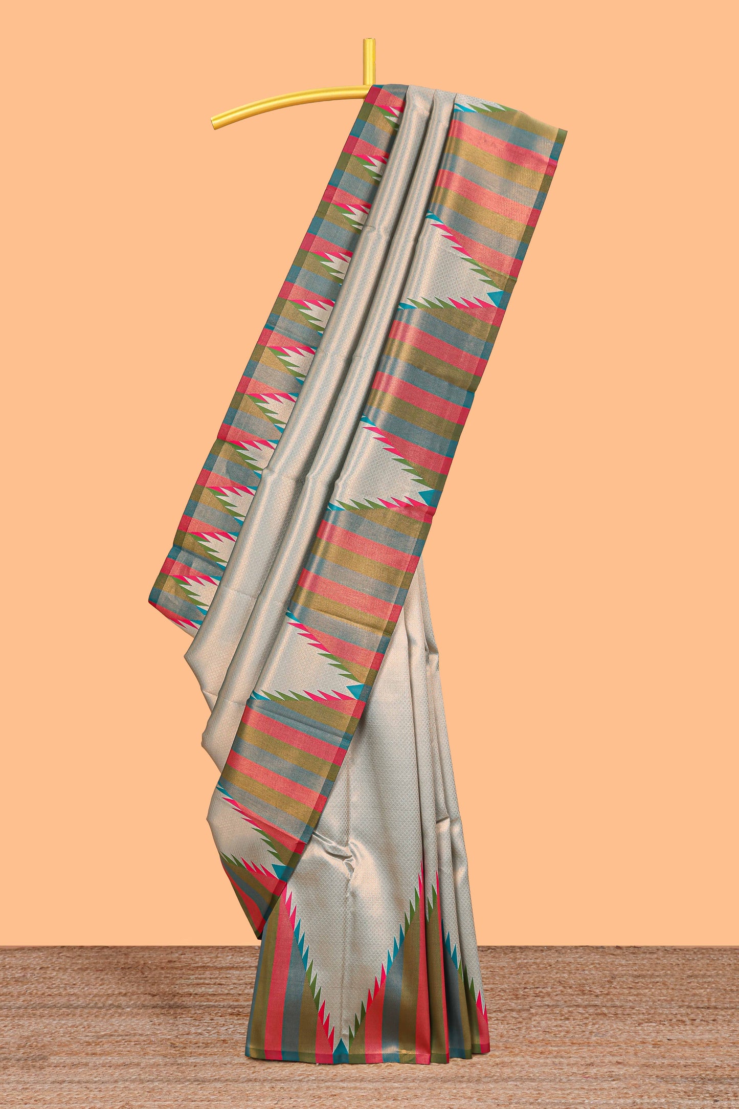 Green plain litchi silk saree with contrast multi color ikkat style border and blouse