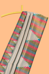 Green plain litchi silk saree with contrast multi color ikkat style border and blouse