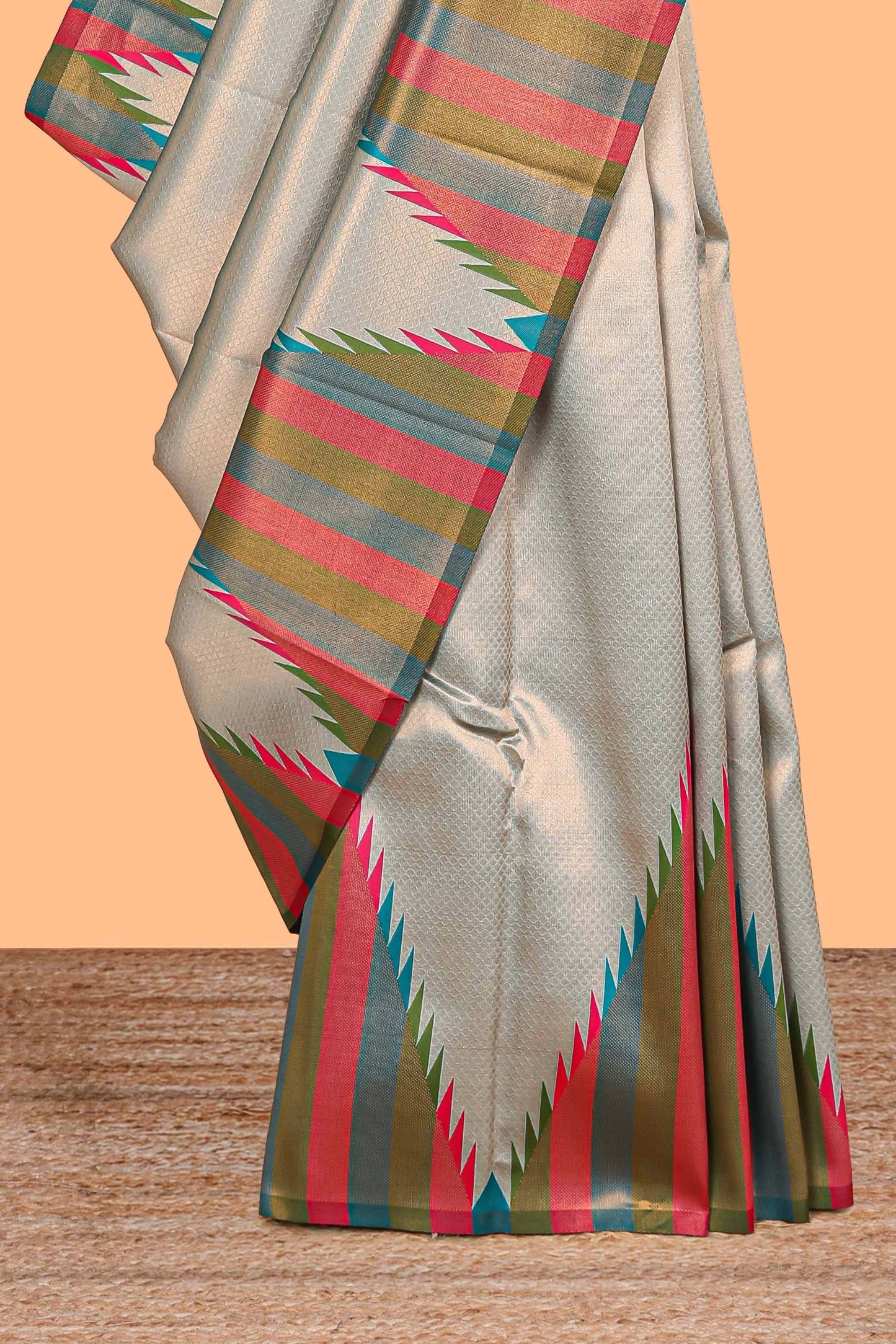 Green plain litchi silk saree with contrast multi color ikkat style border and blouse