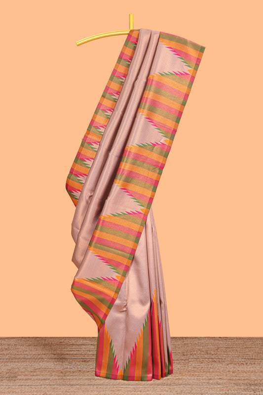 Pale pink plain litchi silk saree with contrast multi color ikkat style border and blouse