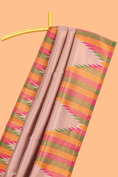 Pale pink plain litchi silk saree with contrast multi color ikkat style border and blouse